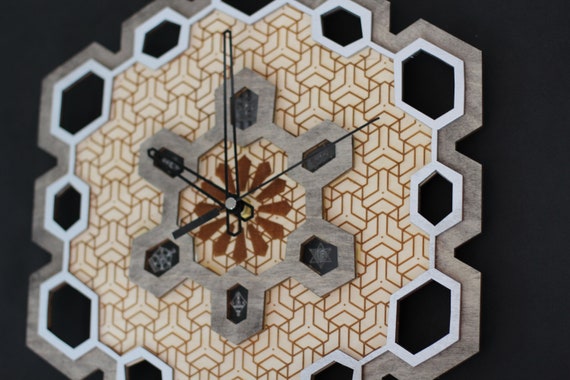 Alternative view of Wooden laser cut wall clock with engraved geometric patterns coming in a wooden, personalised box